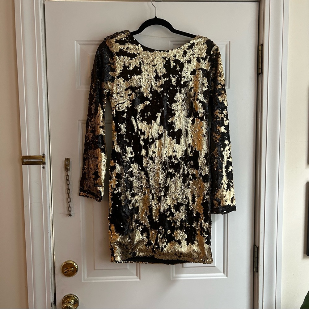 Black and gold sequin mini dress